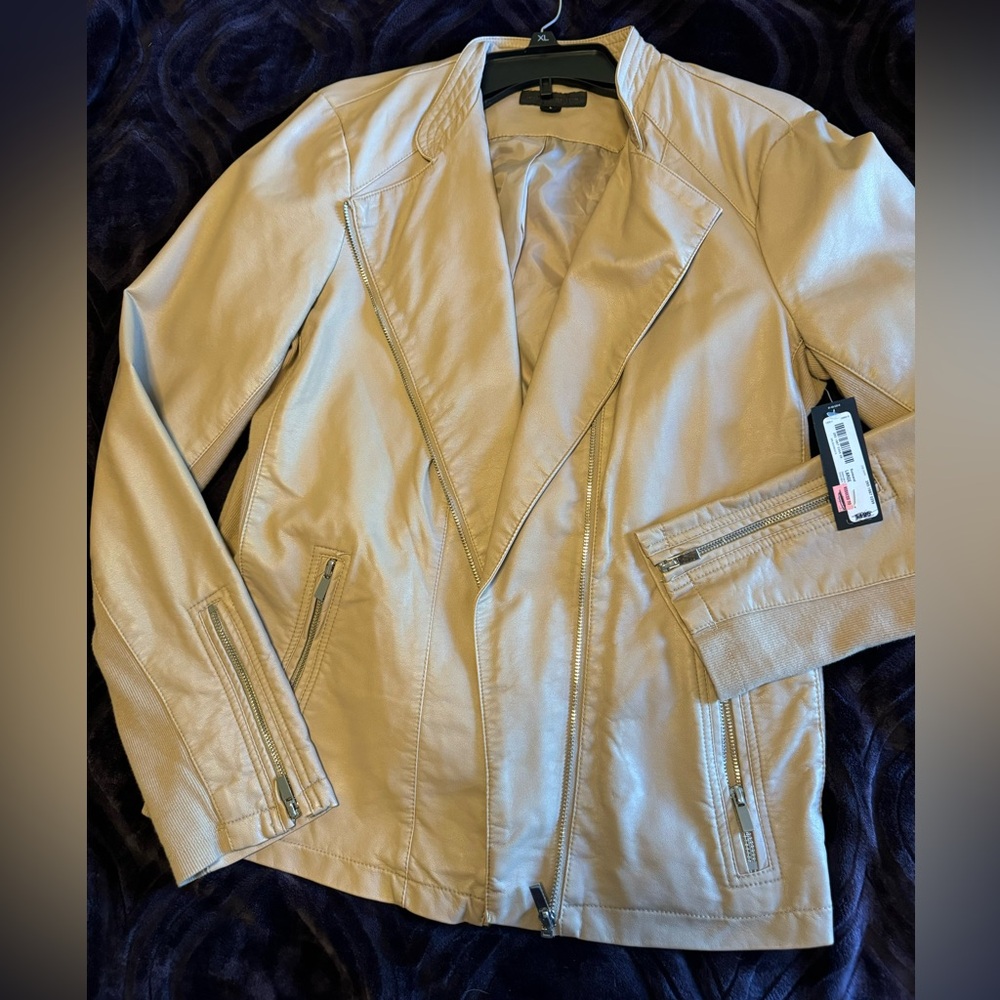 Women light leather like jacket